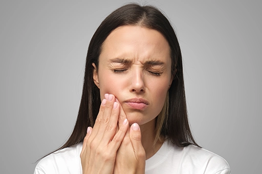 woman with tooth pain
